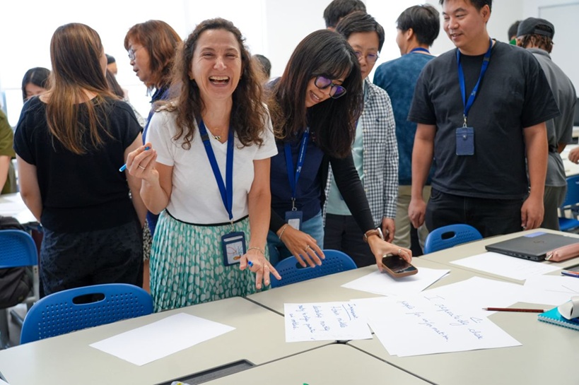 employee smiling during a corporate training program with Ceicia